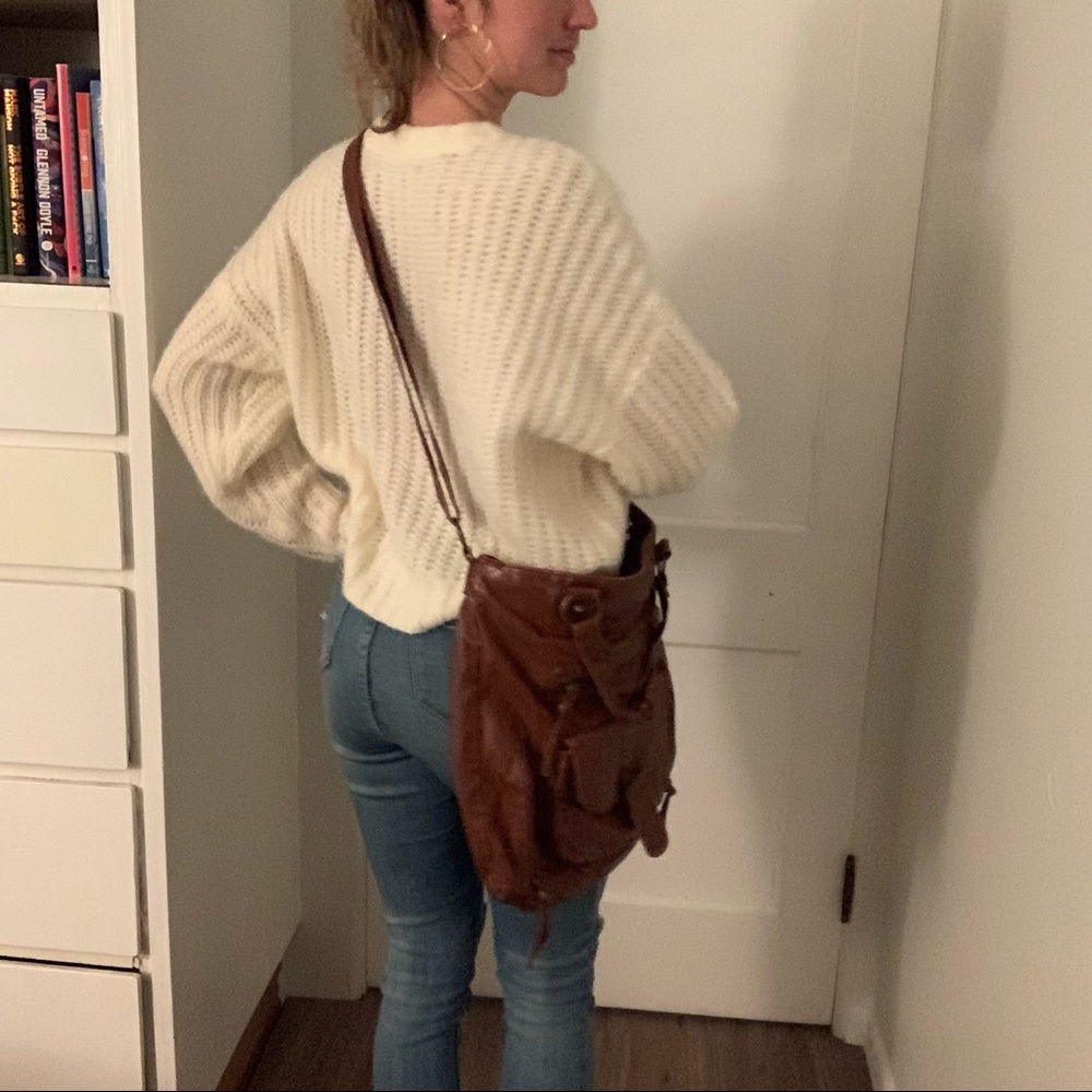 Trendy brown satchel purse, with over the shoulder option! Trusty Kohl’s brand